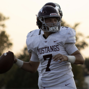 Central sophomore Griffin Hall lines up a pass earlier this season. His dual threat abilities have added a different look to the Mustang offense. 